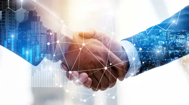 Business handshake over a digital city skyline